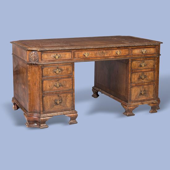 A Stately Walnut Desk In the George III Style